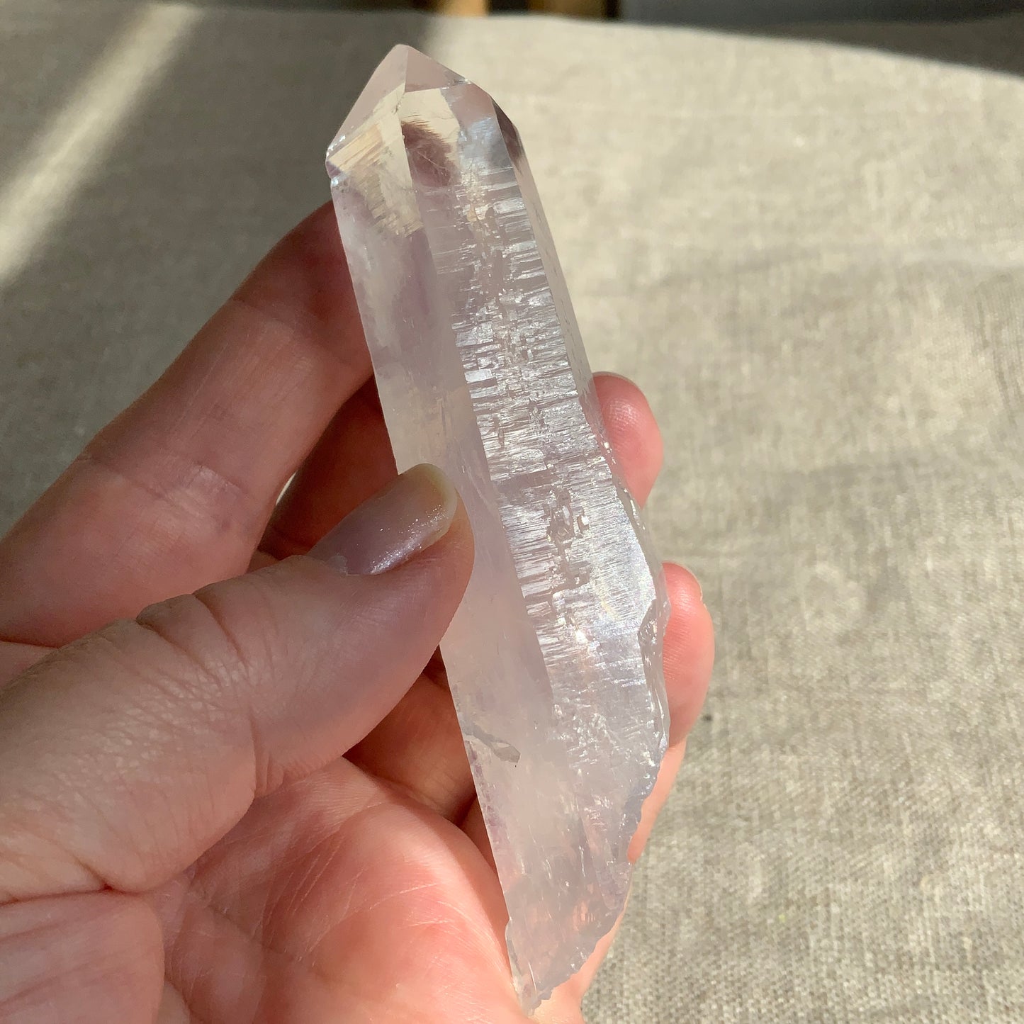 Blue Smoke DNA Lemurian Quartz Point. Ethically Sourced with baby inner child crystal.