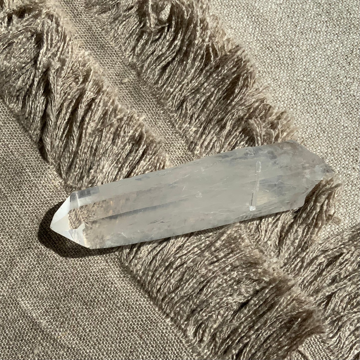 Blue Smoke DNA Lemurian Quartz Point. Ethically Sourced with baby inner child crystal.