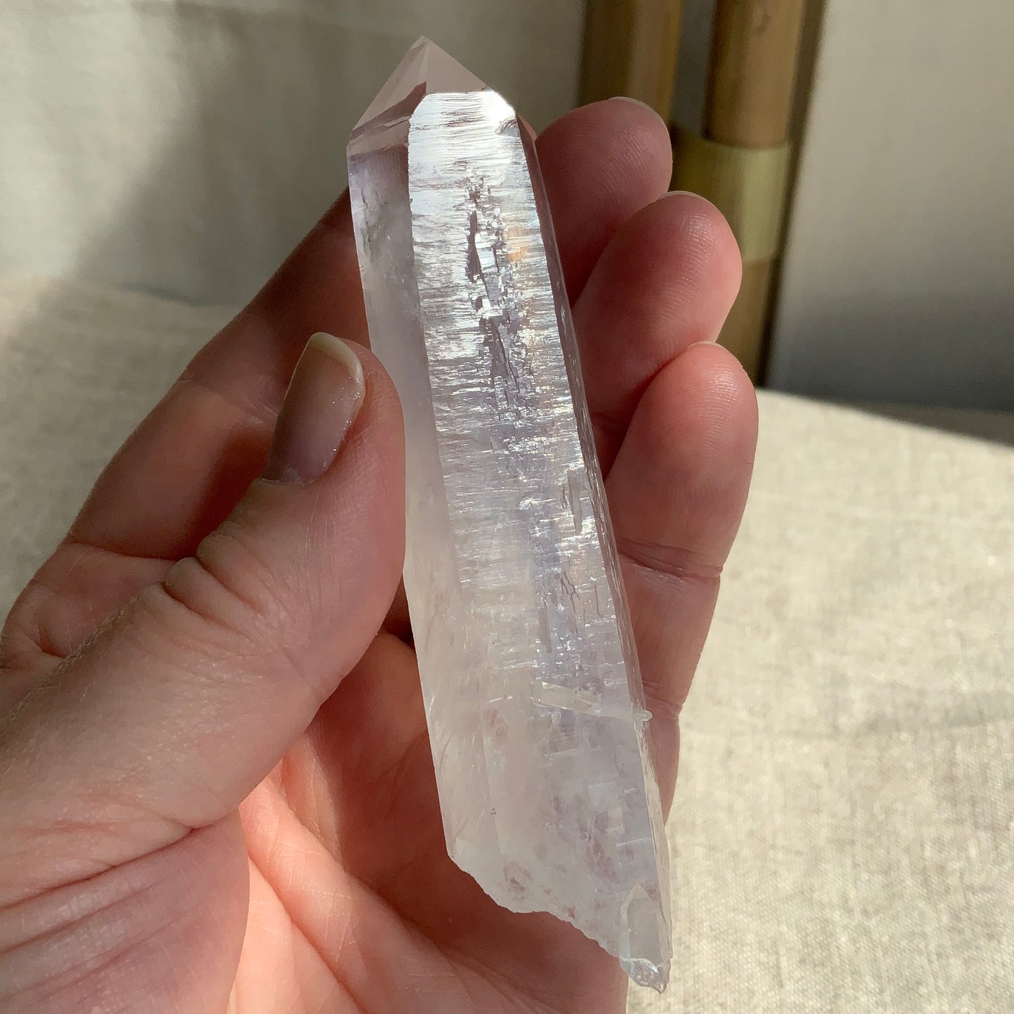 Blue Smoke DNA Lemurian Quartz Point. Ethically Sourced with baby inner child crystal.